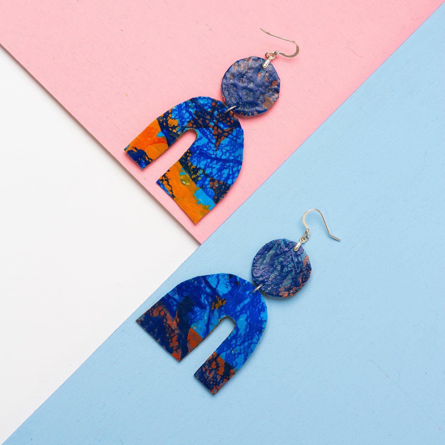 Medium striking shape colourful earrings in orange and blue- S/S 24