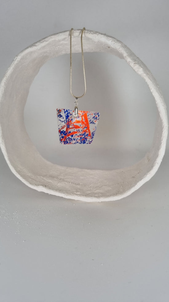 Red and blue metalic print over clear plastic bottle necklace - PLASTIQUE By Siân