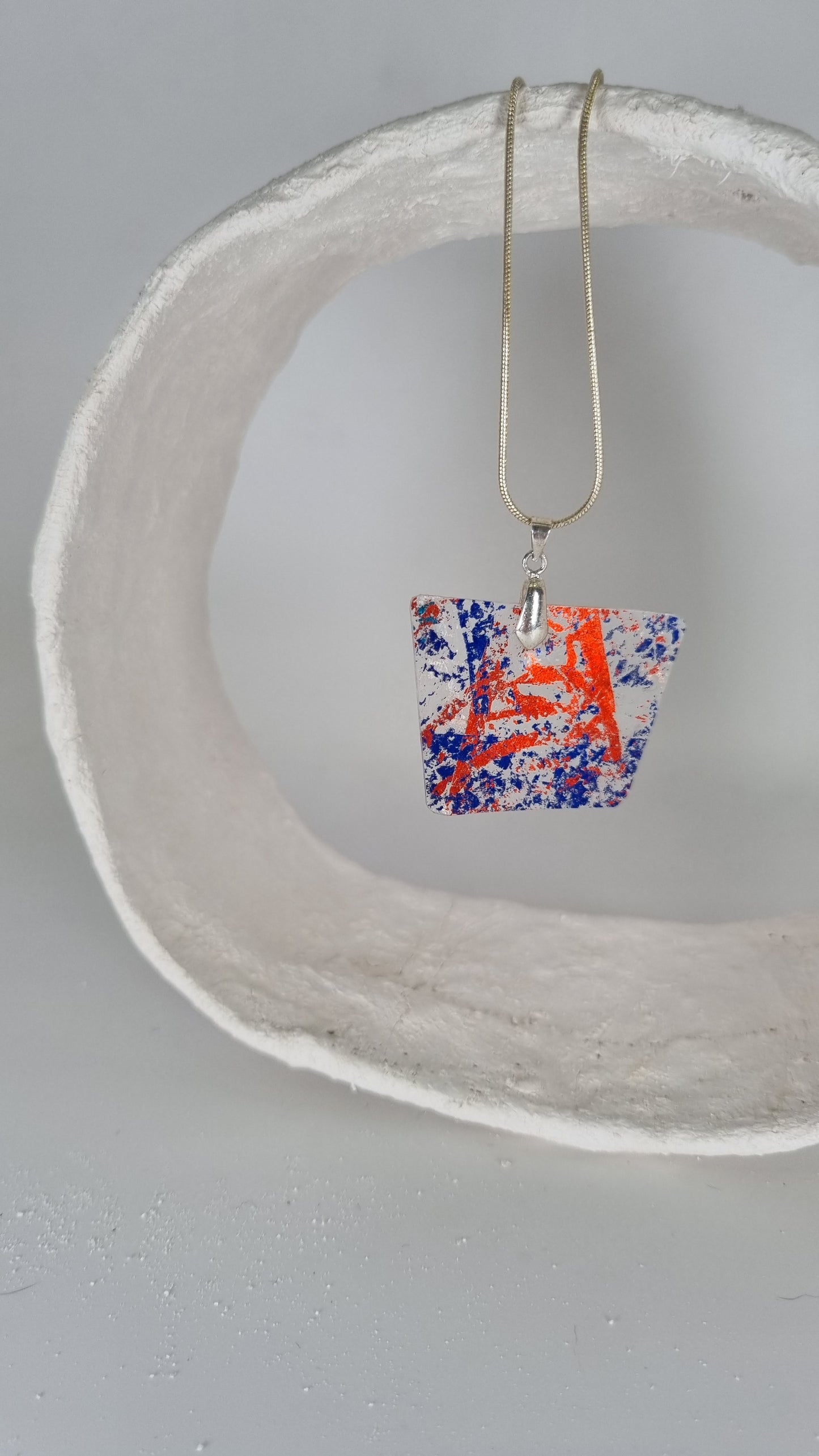 Red and blue metalic print over clear plastic bottle necklace - PLASTIQUE By Siân