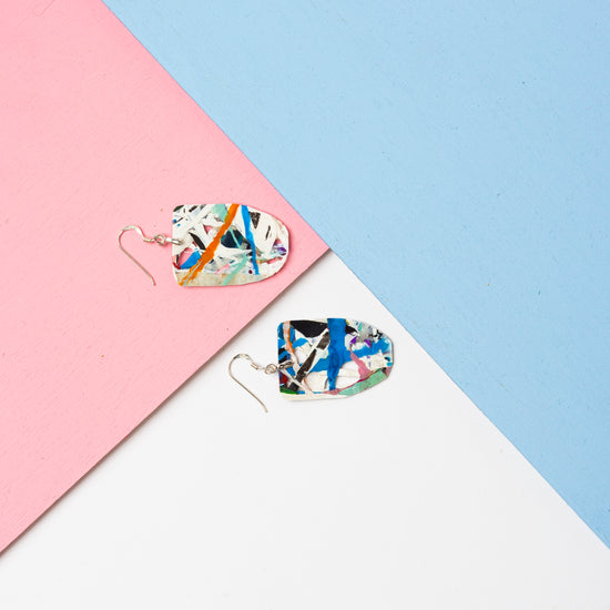 Small Jackson Pollock style guitar lovers plectrum blue, black and orange, red and white abstract earrings- S/S 24