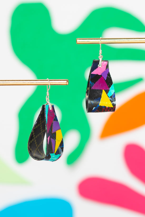 Medium striking colourful folded 80s earrings in pink, yellow, purple, green on black - S/S 24