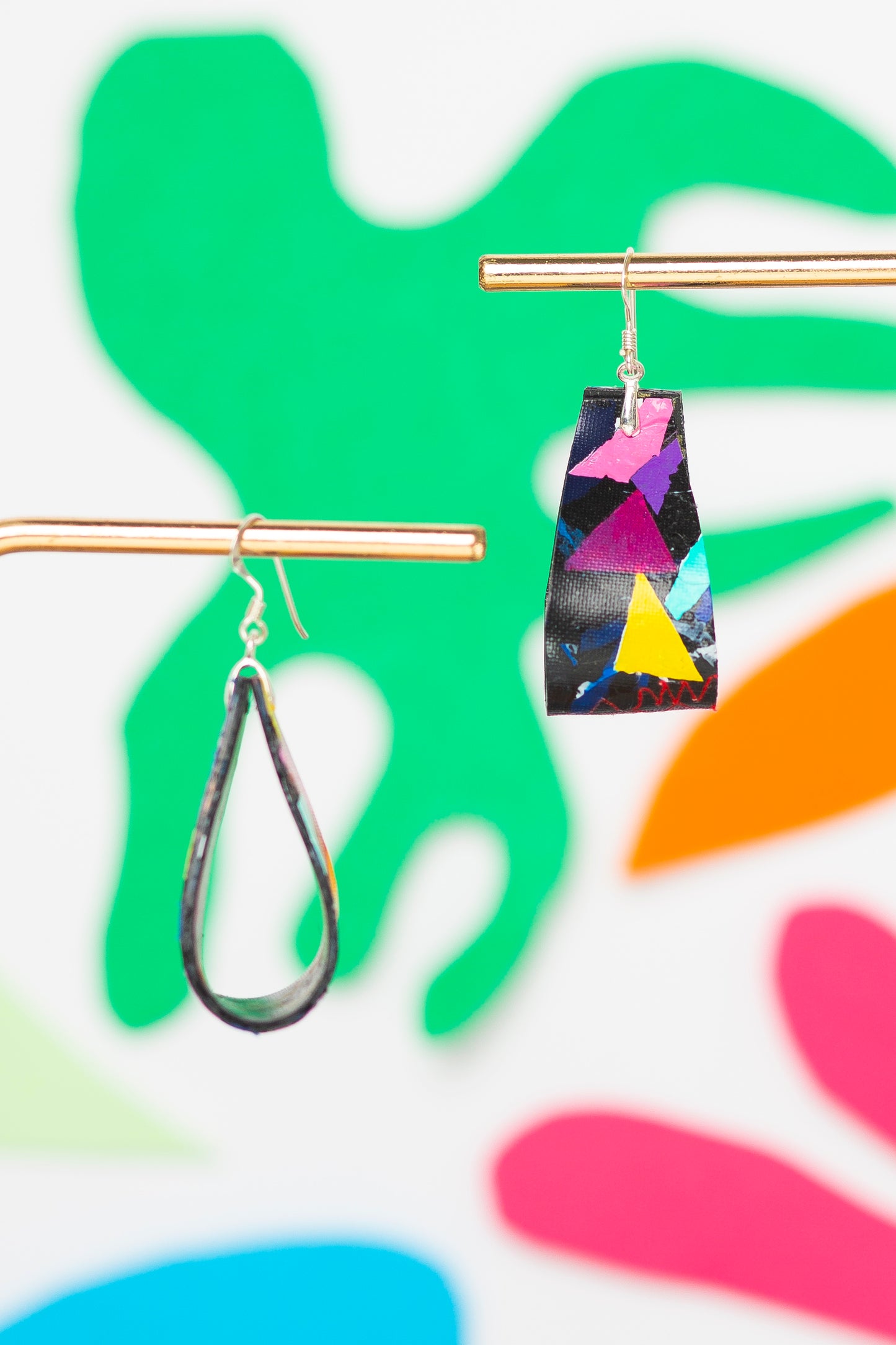 Medium striking colourful folded 80s earrings in pink, yellow, purple, green on black - S/S 24