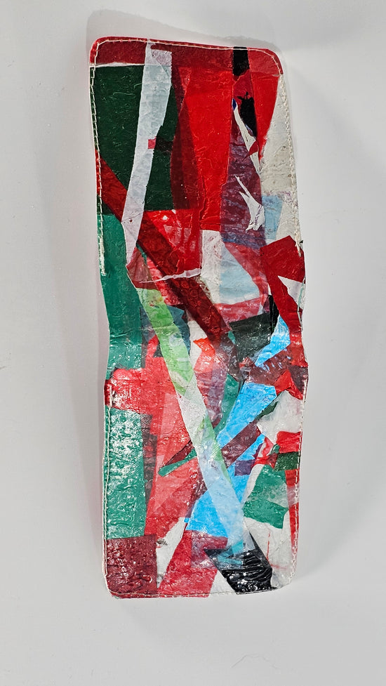 Card wallet: Green, black, blue, red and white stitched from upcycled plastic - PLASTIQUE By Siân