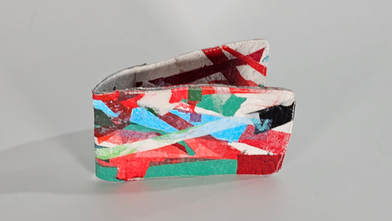 Card wallet: Green, black, blue, red and white stitched from upcycled plastic - PLASTIQUE By Siân