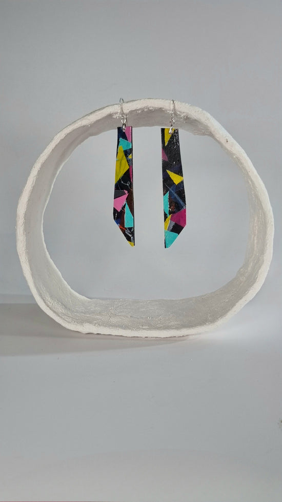 Large striking colourful long thin 80s earrings in pink, yellow, purple, green on black - S/S 24 - PLASTIQUE By Siân