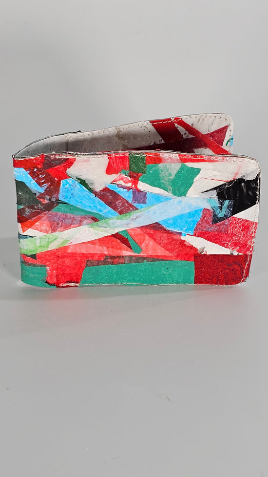 Card wallet: Green, black, blue, red and white stitched from upcycled plastic - PLASTIQUE By Siân