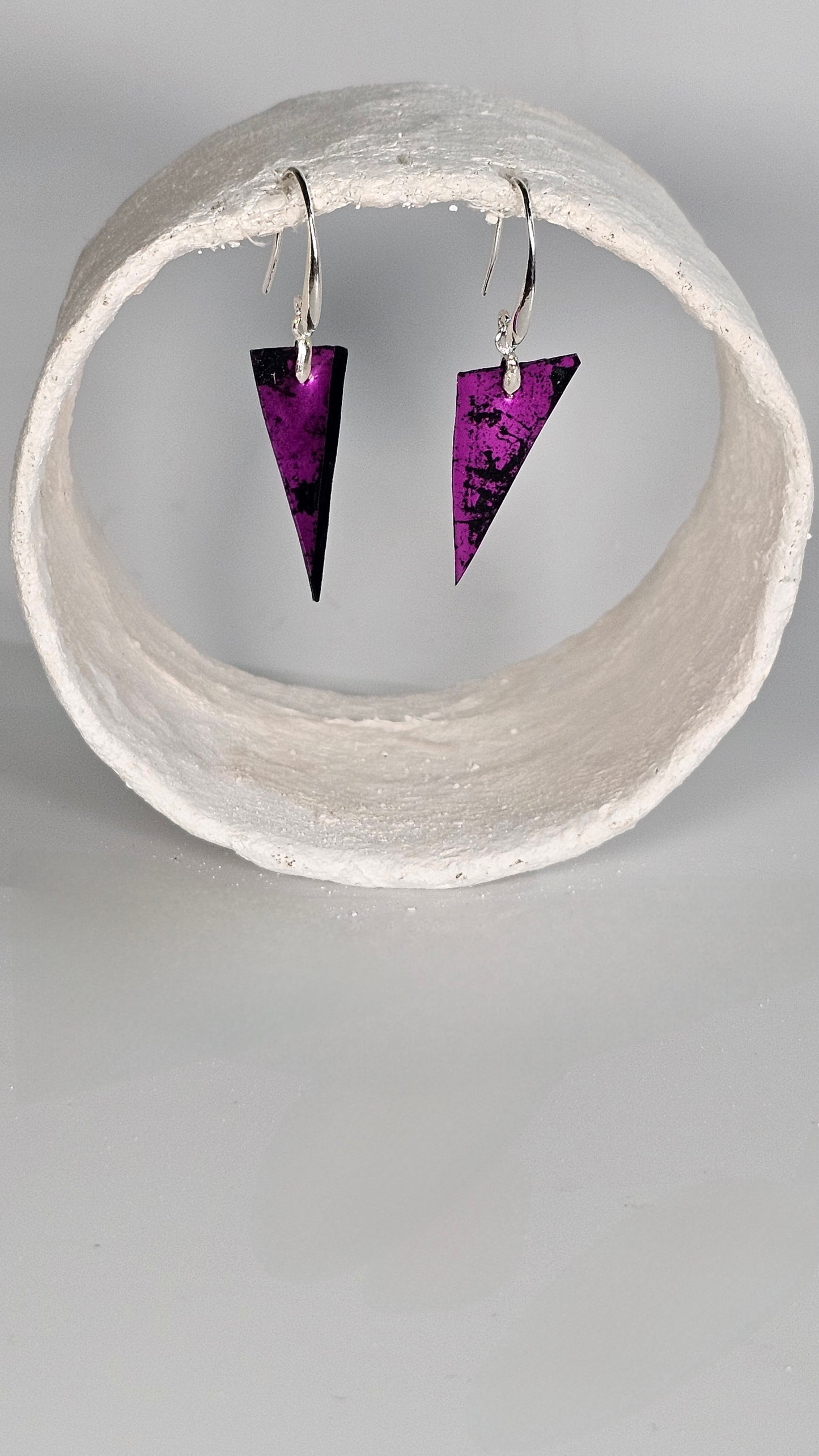 Small triangle magenta foiling print over black and clear plastic earrings - PLASTIQUE By Siân