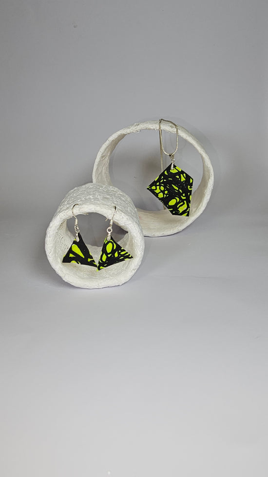 Asymetric shaped black swirl design on lime green jewellery set