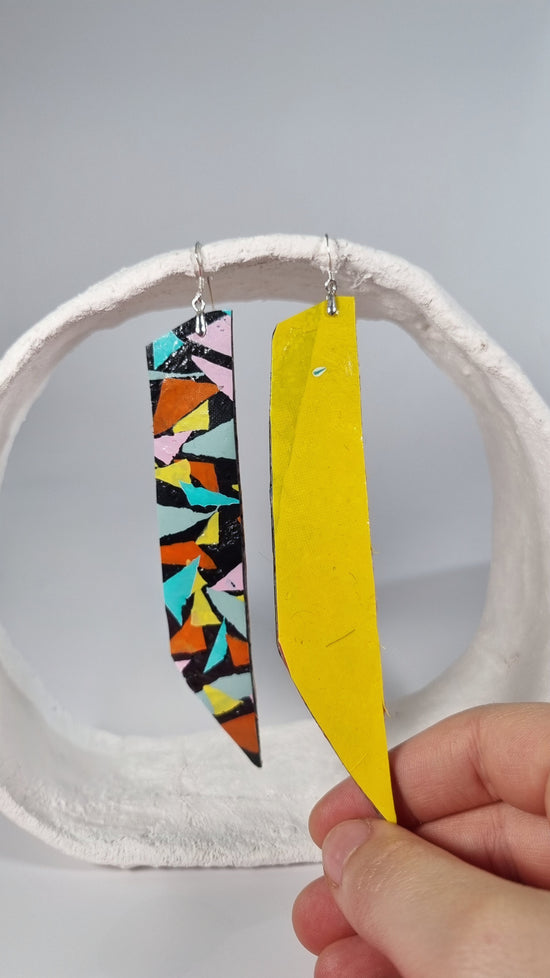 Ex Large striking colourful long thin 80s earrings in yellow, orange, green on black with a yellow backing - S/S 24 - PLASTIQUE By Siân