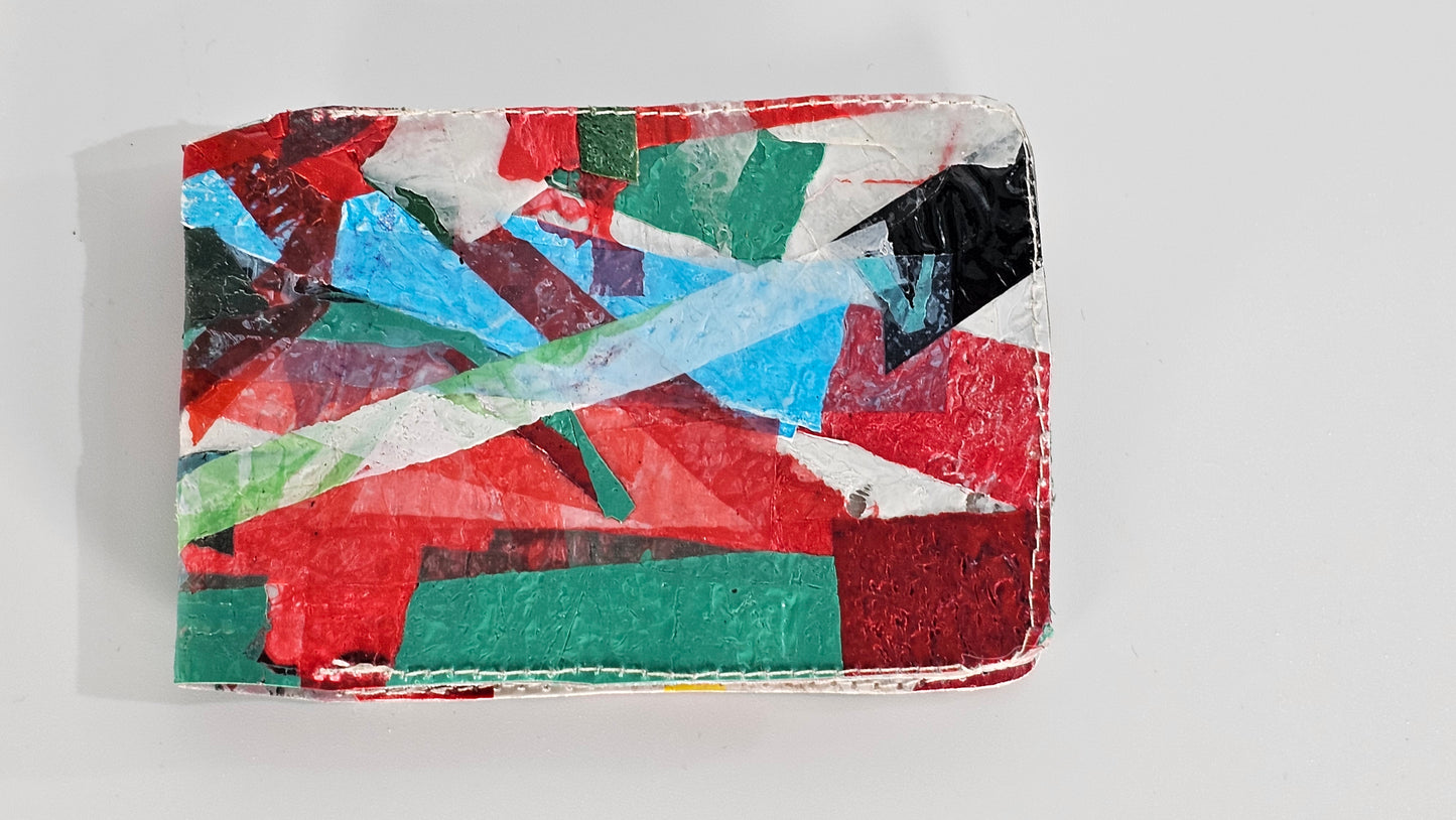 Card wallet: Green, black, blue, red and white stitched from upcycled plastic - PLASTIQUE By Siân