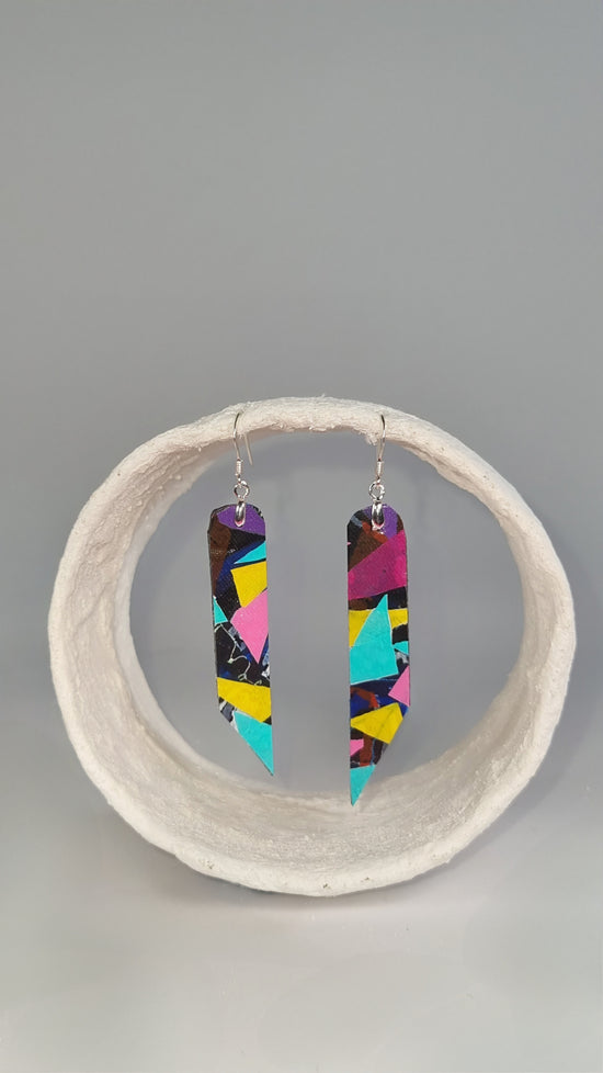 Medium striking colourful long thin 80s earrings in pink, yellow, purple, green on black - S/S 24 - PLASTIQUE By Siân